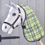 A close-up of a gray stick horse toy with a black halter and a Stable Blanket Lemon Blue by Hobby Horse LarDen, set against a wooden background.