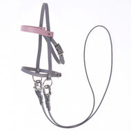 The Grey leatherette set by Hobby Horse LarDen includes a bridle, reins, and martingale in grey and light pink faux leather with metal buckles and rings, shown against a white background.