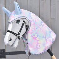 Pastel pink and blue Hobby Horse raincoat worn on a grey Hobby Horse with silver trim
