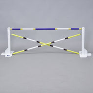 The Hobby Horse LarDen Jump 50 cm / 20 inch with Extra Poles is a white and yellow adjustable hurdle with crossed bars and measurement markings—ideal for hobby horsing and fun indoor or outdoor activities.